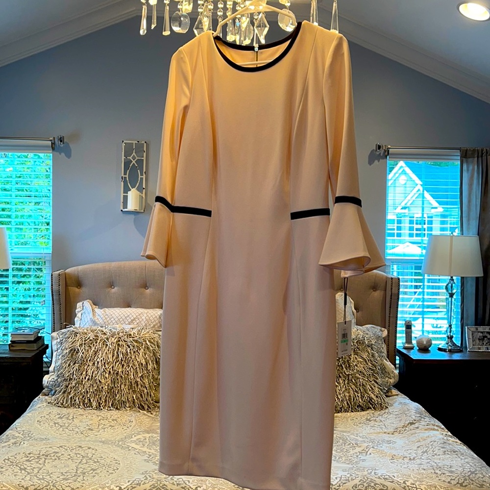 Classic Calvin Klein cream/ light pinkish dress with flare cuff and black trim